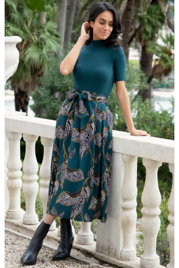 Fustă midi elegantă în verde închis cu imprimeul floral abstract.