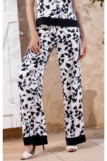 Pantaloni eleganți cu siluetă lejeră în alb și negru 